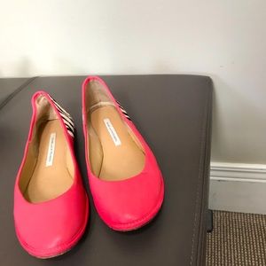 Designer Pink flats with black and white fake zebra fur on the heels
